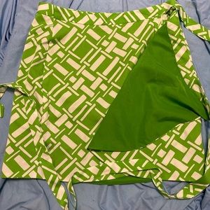 Wrap around green mini skirt